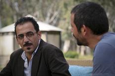 Τα δύο από τα τρία μέλη του συνεργείου του BBC που συνελήφθησαν, ο Φεράς Κιλάνι(αριστερά) και ο Γκοκτάι Κοραλτάν(δεξιά)